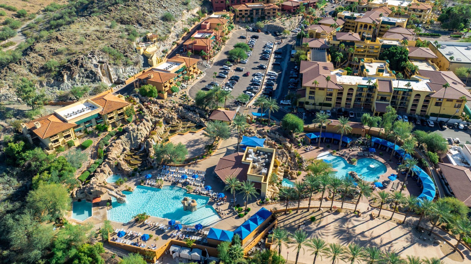Tapatio Cliffs resort buildings and palm-lined entry
